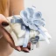 Bomboniere Eleganti con Fiore in Porcellana e Cuscini con Confezione