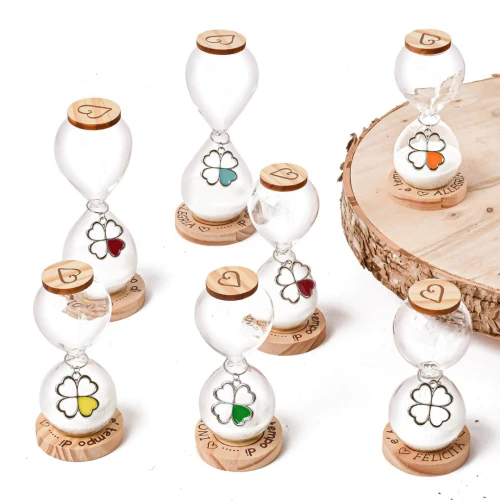 Bomboniere 2026 Linea Temps Clessidre con base in legno e ciondolo quadrifoglio