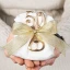 Bomboniere 50° Compleanno Apribottiglia in metallo dorato con strass