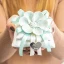 Bomboniere Eleganti con Fiore in Porcellana e Cuscini con Confezione