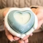 Bomboniere Linea Hands 2027 Mani che tengono cuore