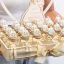 Torta bomboniere Nozze oro 24 barattolini con carrozze