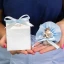 Idea bomboniera angioletto colore argento con cuore e stella