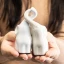 Bomboniere coppia Elefanti in ceramica intrecciati 2027