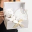 Cofanetto con orsetto doudou e bavetta unisex color avorio